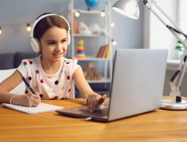 Girl using laptop for online fundraising